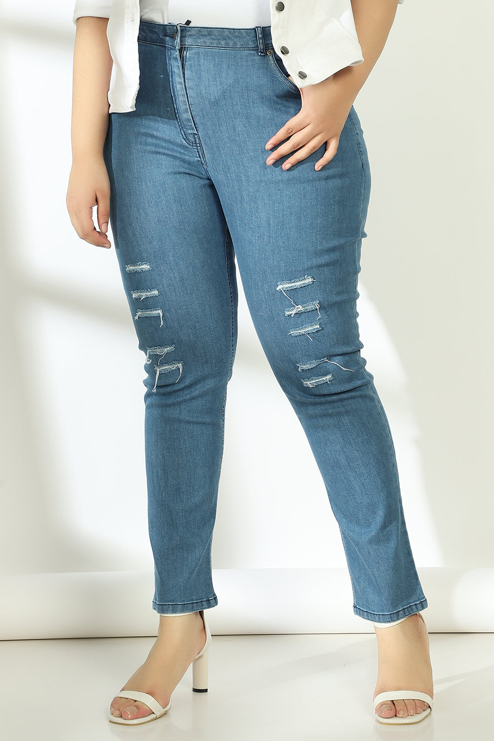 Mid Wash Ripped Denims for Women